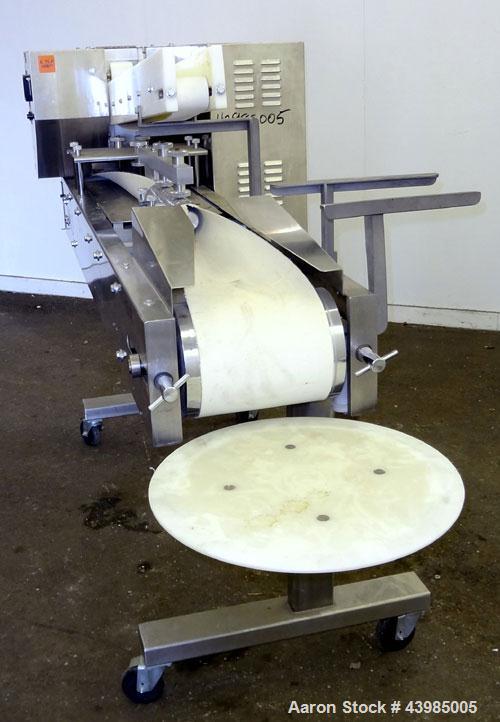 Used Baking Machines Table Top Bagel Divider / Former, Model BM-DF-3000.  304 Stainless steel construction. Approximately 3000 bagels per hour. Scaling range from 1 oz. to 6 oz.  3” Wide x 42” long i...