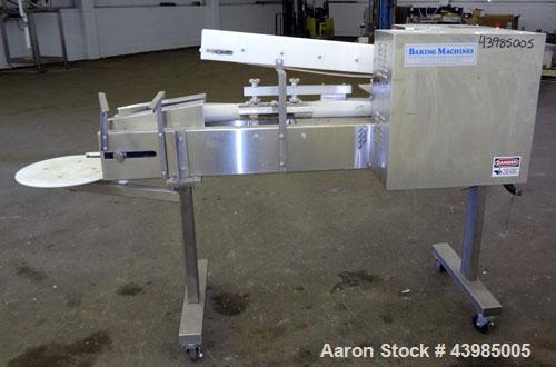 Used Baking Machines Table Top Bagel Divider / Former, Model BM-DF-3000.  304 Stainless steel construction. Approximately 3000 bagels per hour. Scaling range from 1 oz. to 6 oz.  3” Wide x 42” long i...