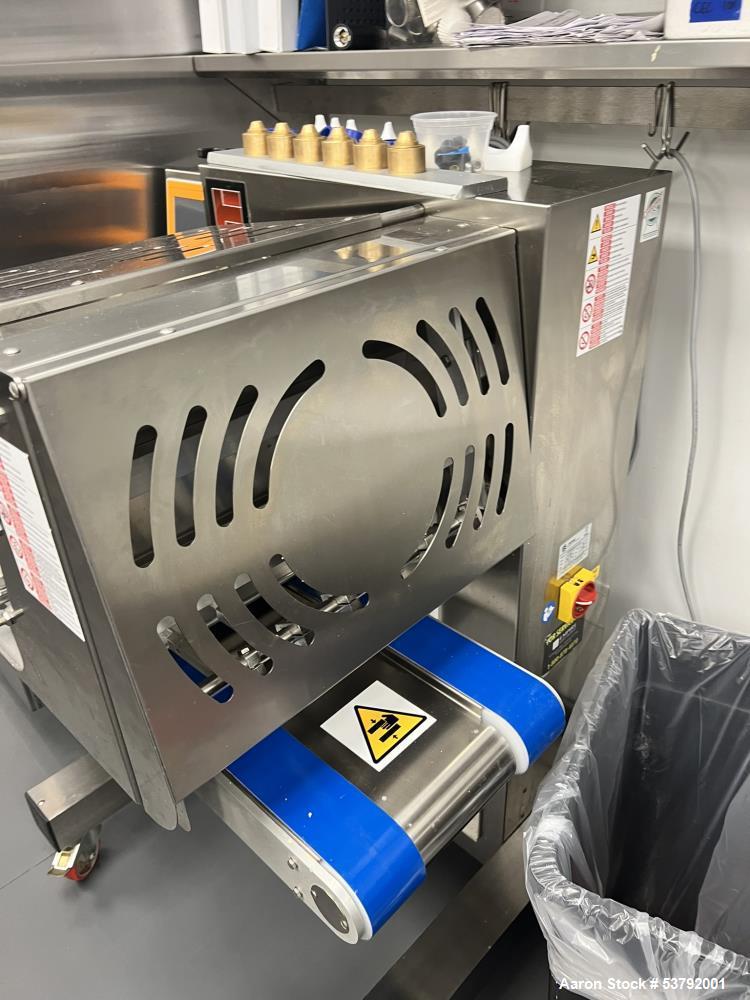 Used Empire Bakery Equipment Cookie Depositor, Model Suprema Maxx, 180 trays per hour. 200 recipe memory capacity.