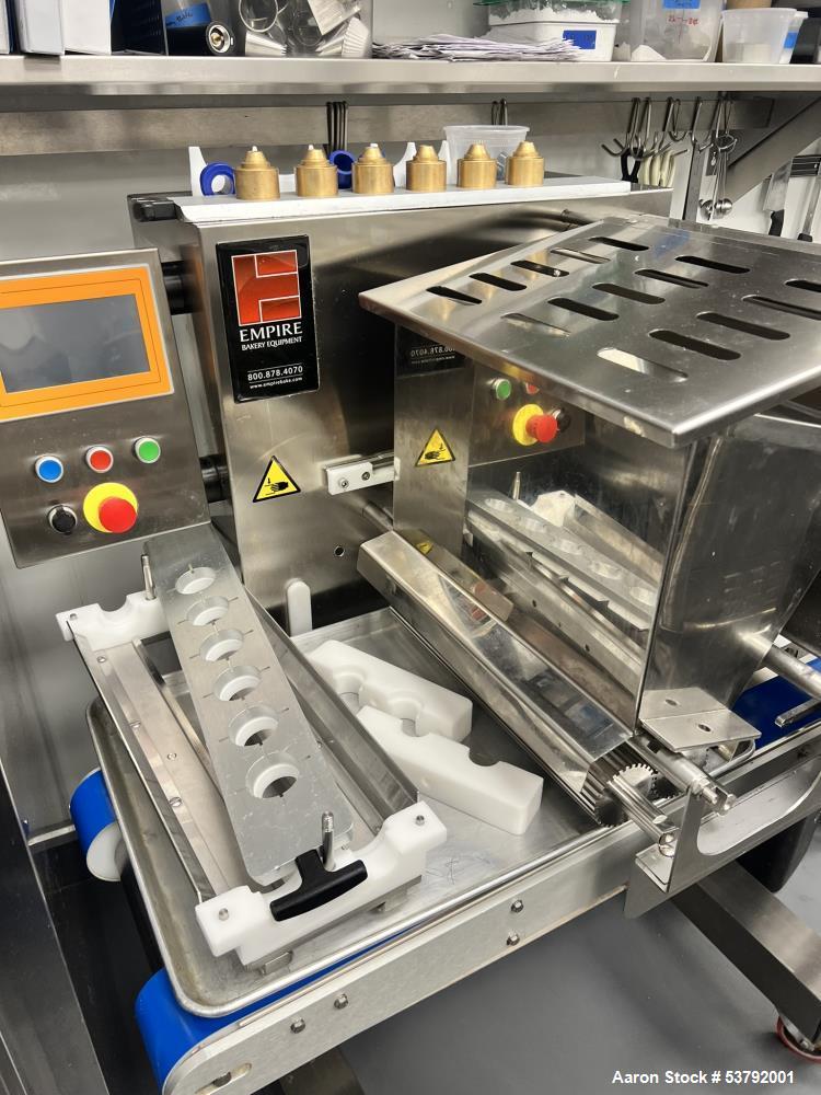 Used Empire Bakery Equipment Cookie Depositor, Model Suprema Maxx, 180 trays per hour. 200 recipe memory capacity.