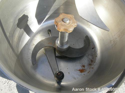 Used Hobart Cutter/Mixer, Model HCM-450, 304 stainless steel. 45 quart (11 gallon) bowl, 19 3/4" diameter x 10" deep with pouring lip. Curved 2 blade cut/mix knife. Plastic top cover with baffle, man...