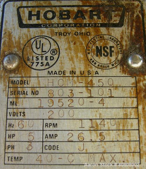 Used Hobart Cutter/Mixer, Model HCM-450, 304 stainless steel. 45 quart (11 gallon) bowl, 19 3/4" diameter x 10" deep with pouring lip. Curved 2 blade cut/mix knife. Plastic top cover with baffle, man...