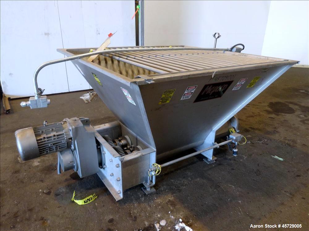 Used Mepaco Dual Auger Feeder, Model 105, 3,000 pound capacity, 304 Stainless Steel. Hopper is 60" long x 64" wide x 36" deep. Includes (2) 8" diameter x 48" long augers, driven by a 7.6kw, 3/60/230/...