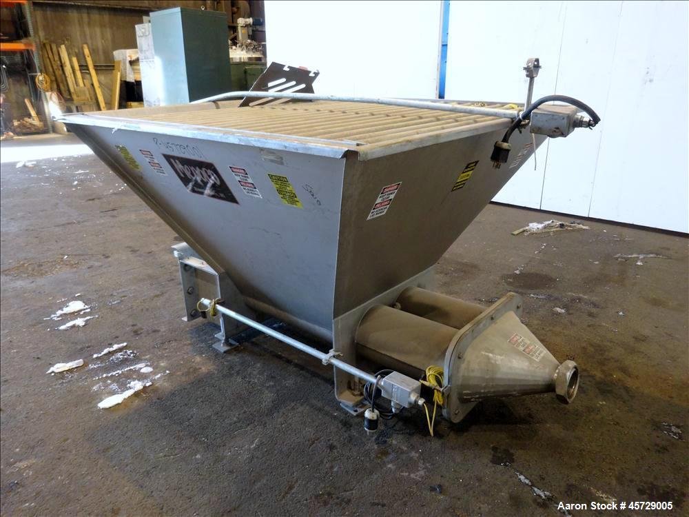 Used Mepaco Dual Auger Feeder, Model 105, 3,000 pound capacity, 304 Stainless Steel. Hopper is 60" long x 64" wide x 36" deep. Includes (2) 8" diameter x 48" long augers, driven by a 7.6kw, 3/60/230/...