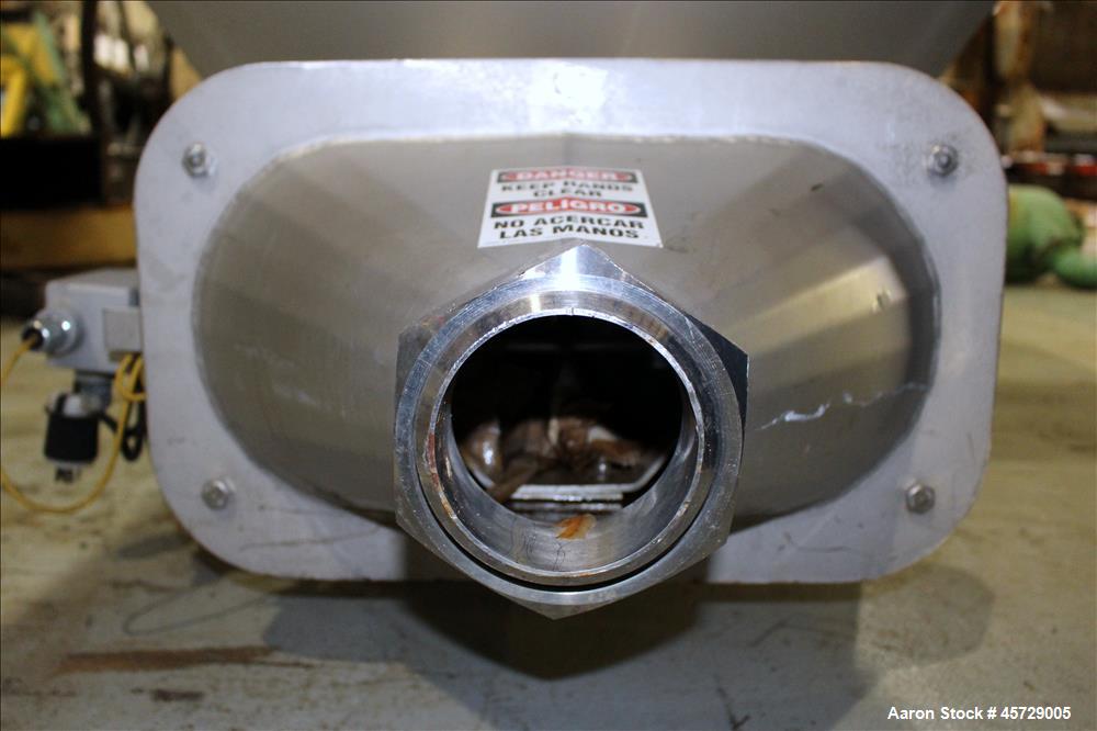 Used Mepaco Dual Auger Feeder, Model 105, 3,000 pound capacity, 304 Stainless Steel. Hopper is 60" long x 64" wide x 36" deep. Includes (2) 8" diameter x 48" long augers, driven by a 7.6kw, 3/60/230/...