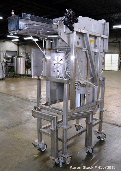 Used Cheese Block Cutter/Portioner. Machine is of stainless steel construction. Designed to cut blocks approximately (length) 17-1/2" x (Width) 14-1/4" x 24". Is an upcut into a cross cut direction m...