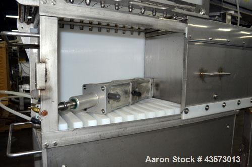 Used Cheese Block Cutter/Portioner. Machine is of stainless steel construction. Designed to cut blocks approximately (length) 17-1/2" x (Width) 14-1/4" x 24". Is an upcut into a cross cut direction m...