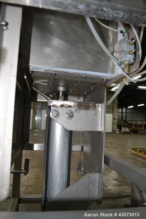 Used Cheese Block Cutter/Portioner. Machine is of stainless steel construction. Designed to cut blocks approximately (length) 17-1/2" x (Width) 14-1/4" x 24". Is an upcut into a cross cut direction m...