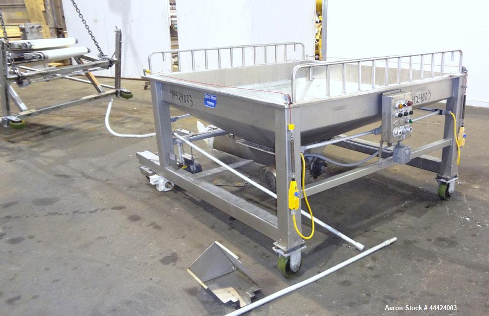 Used Peerless Spiral Flow Dough Feeder, Model SF-20CT, 304 Stainless Steel. 2000 Pound hopper capacity, approximately 66” long x 66” wide. Includes an approximately 8” diameter spiral auger, driven b...