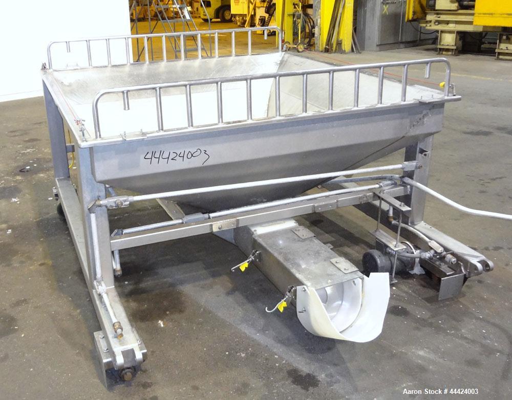 Used Peerless Spiral Flow Dough Feeder, Model SF-20CT, 304 Stainless Steel. 2000 Pound hopper capacity, approximately 66” long x 66” wide. Includes an approximately 8” diameter spiral auger, driven b...