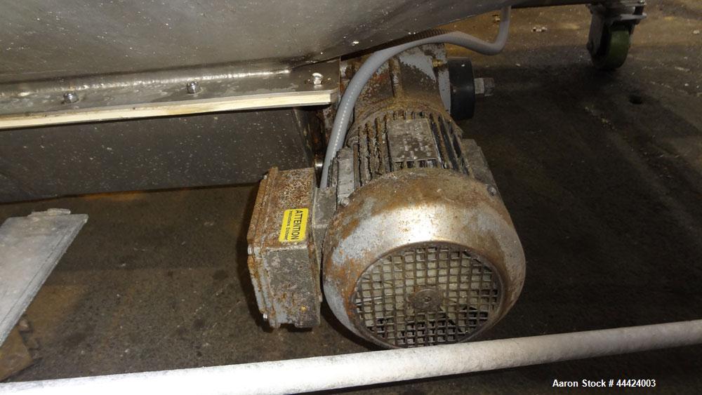 Used Peerless Spiral Flow Dough Feeder, Model SF-20CT, 304 Stainless Steel. 2000 Pound hopper capacity, approximately 66” long x 66” wide. Includes an approximately 8” diameter spiral auger, driven b...