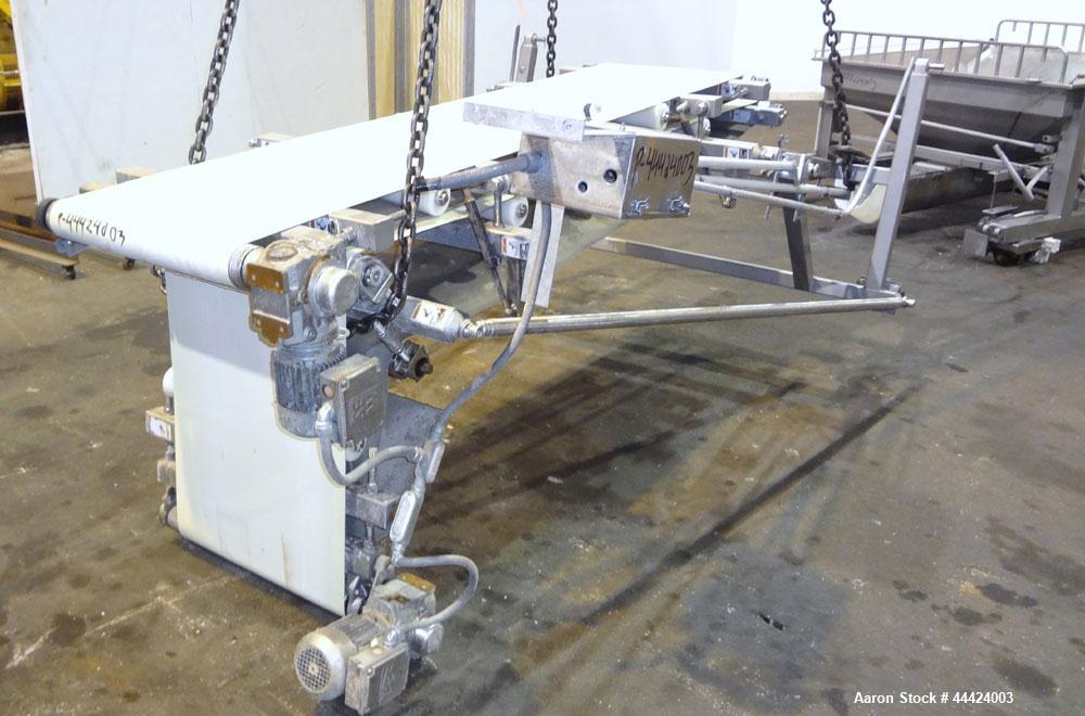 Used Peerless Spiral Flow Dough Feeder, Model SF-20CT, 304 Stainless Steel. 2000 Pound hopper capacity, approximately 66” long x 66” wide. Includes an approximately 8” diameter spiral auger, driven b...