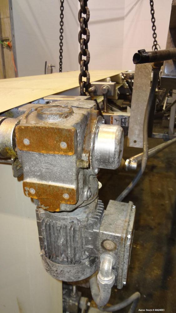 Used Peerless Spiral Flow Dough Feeder, Model SF-20CT, 304 Stainless Steel. 2000 Pound hopper capacity, approximately 66” long x 66” wide. Includes an approximately 8” diameter spiral auger, driven b...