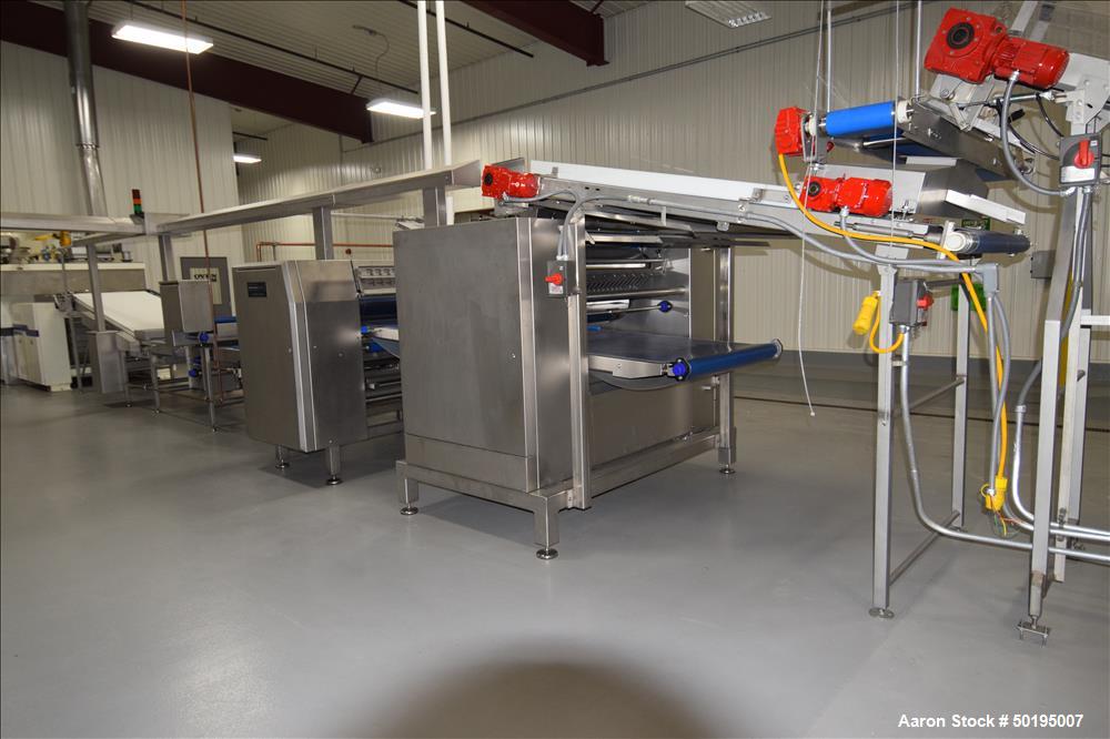Used Rademaker Sheeting System For Chips, 1000mm Wide, Serial# 7193, Built 2008. Consisting of: (1) 10" wide x 96" long rubber belt conveyor with a 0.37kw gear motor, (1) 3 roll inclined belt feeder ...
