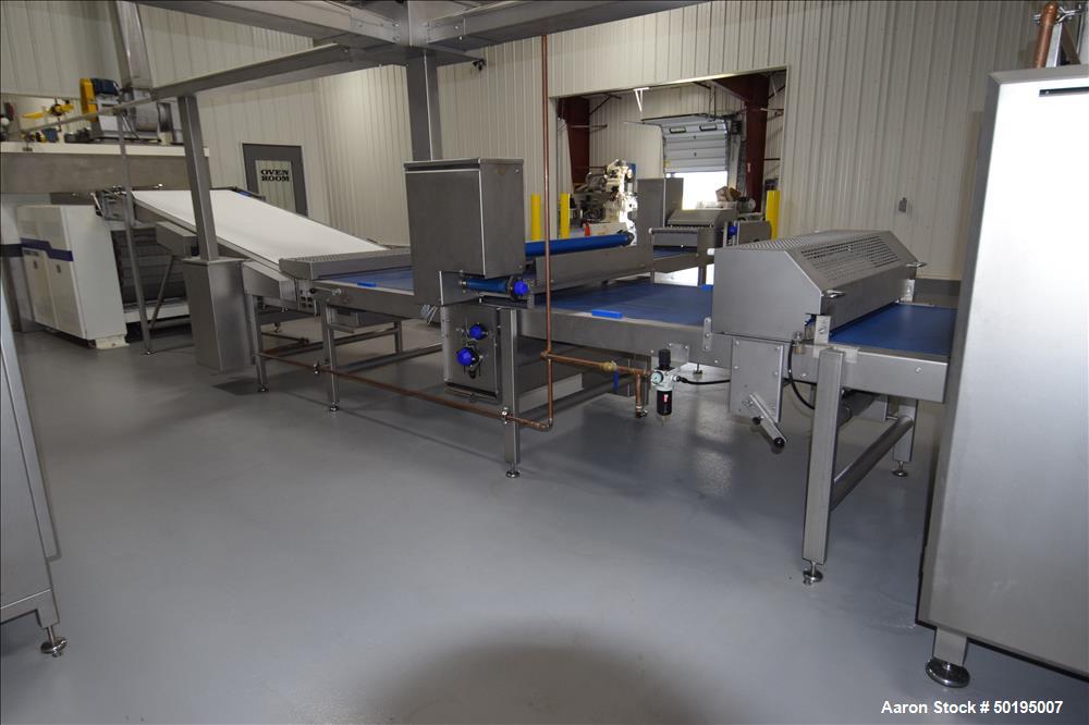 Used Rademaker Sheeting System For Chips, 1000mm Wide, Serial# 7193, Built 2008. Consisting of: (1) 10" wide x 96" long rubber belt conveyor with a 0.37kw gear motor, (1) 3 roll inclined belt feeder ...