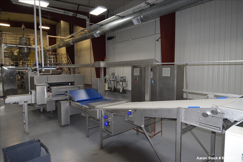 Used Rademaker Sheeting System For Chips, 1000mm Wide, Serial# 7193, Built 2008. Consisting of: (1) 10" wide x 96" long rubber belt conveyor with a 0.37kw gear motor, (1) 3 roll inclined belt feeder ...
