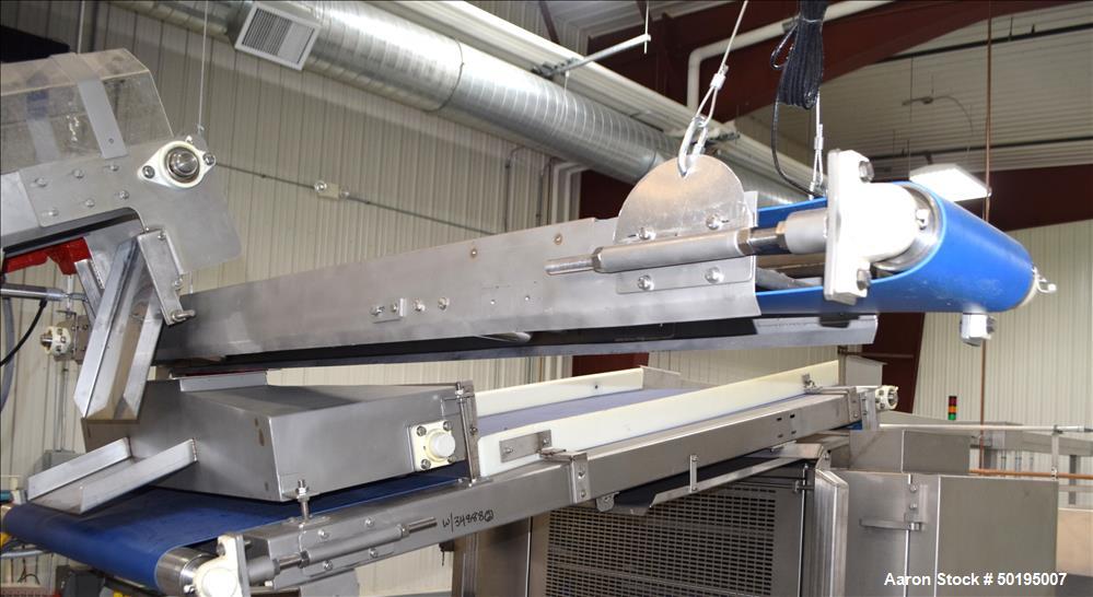 Used Rademaker Sheeting System For Chips, 1000mm Wide, Serial# 7193, Built 2008. Consisting of: (1) 10" wide x 96" long rubber belt conveyor with a 0.37kw gear motor, (1) 3 roll inclined belt feeder ...