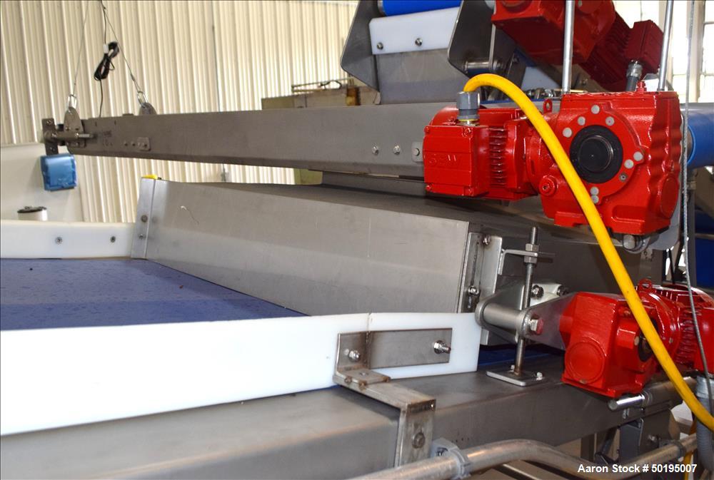 Used Rademaker Sheeting System For Chips, 1000mm Wide, Serial# 7193, Built 2008. Consisting of: (1) 10" wide x 96" long rubber belt conveyor with a 0.37kw gear motor, (1) 3 roll inclined belt feeder ...