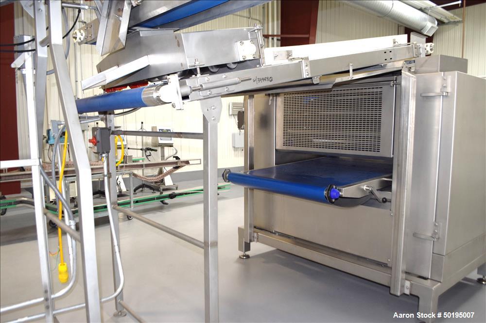 Used Rademaker Sheeting System For Chips, 1000mm Wide, Serial# 7193, Built 2008. Consisting of: (1) 10" wide x 96" long rubber belt conveyor with a 0.37kw gear motor, (1) 3 roll inclined belt feeder ...