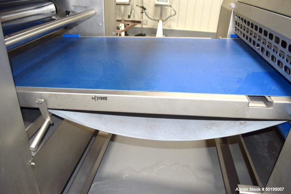Used Rademaker Sheeting System For Chips, 1000mm Wide, Serial# 7193, Built 2008. Consisting of: (1) 10" wide x 96" long rubber belt conveyor with a 0.37kw gear motor, (1) 3 roll inclined belt feeder ...