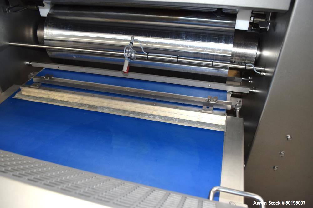 Used Rademaker Sheeting System For Chips, 1000mm Wide, Serial# 7193, Built 2008. Consisting of: (1) 10" wide x 96" long rubber belt conveyor with a 0.37kw gear motor, (1) 3 roll inclined belt feeder ...