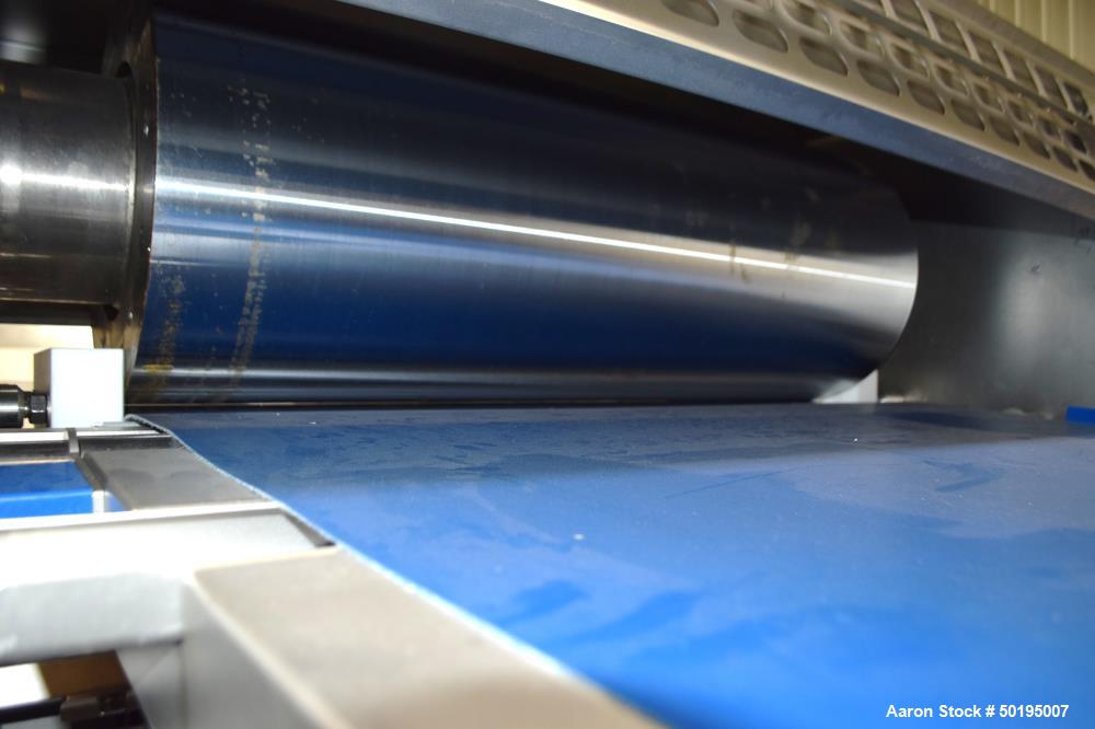 Used Rademaker Sheeting System For Chips, 1000mm Wide, Serial# 7193, Built 2008. Consisting of: (1) 10" wide x 96" long rubber belt conveyor with a 0.37kw gear motor, (1) 3 roll inclined belt feeder ...
