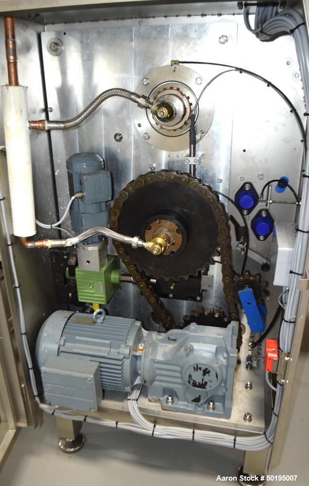 Used Rademaker Sheeting System For Chips, 1000mm Wide, Serial# 7193, Built 2008. Consisting of: (1) 10" wide x 96" long rubber belt conveyor with a 0.37kw gear motor, (1) 3 roll inclined belt feeder ...