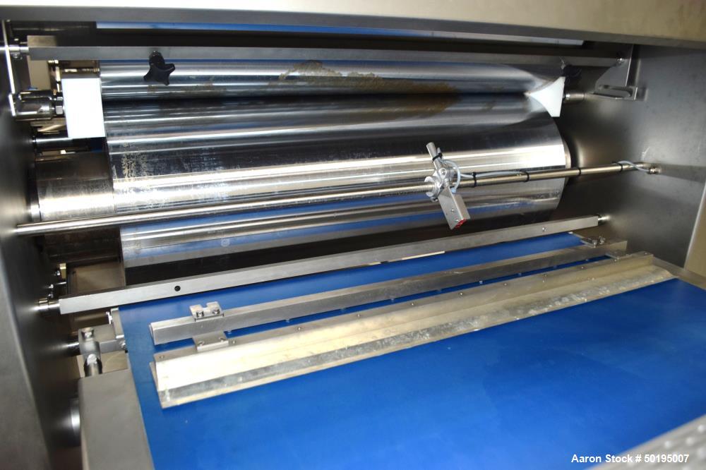 Used Rademaker Sheeting System For Chips, 1000mm Wide, Serial# 7193, Built 2008. Consisting of: (1) 10" wide x 96" long rubber belt conveyor with a 0.37kw gear motor, (1) 3 roll inclined belt feeder ...