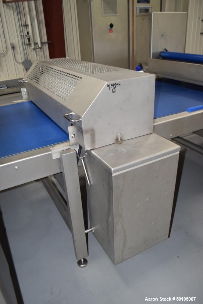 Used Rademaker Sheeting System For Chips, 1000mm Wide, Serial# 7193, Built 2008. Consisting of: (1) 10" wide x 96" long rubber belt conveyor with a 0.37kw gear motor, (1) 3 roll inclined belt feeder ...
