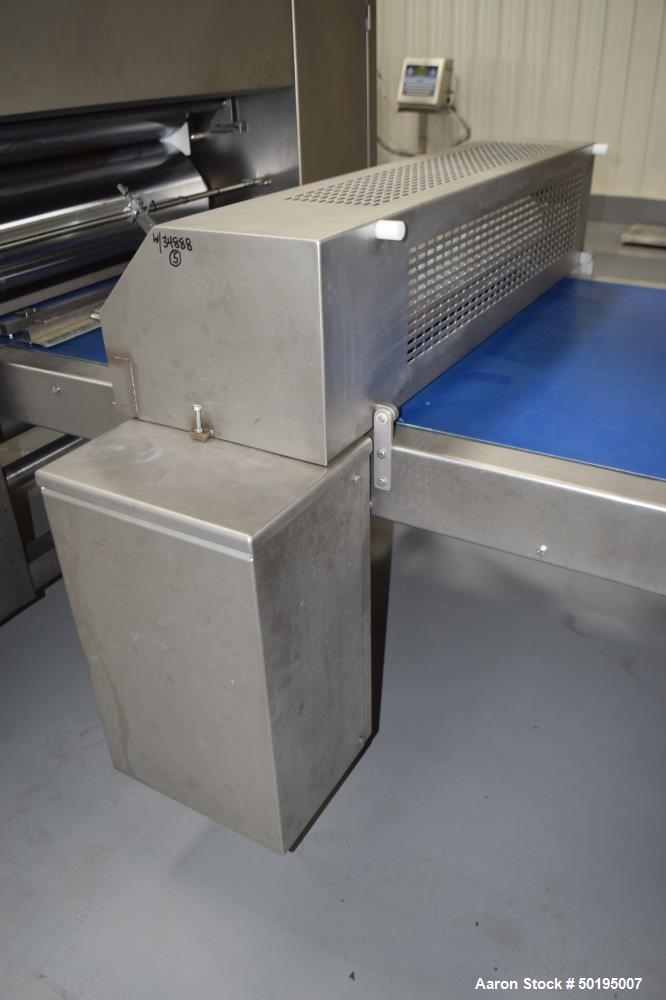 Used Rademaker Sheeting System For Chips, 1000mm Wide, Serial# 7193, Built 2008. Consisting of: (1) 10" wide x 96" long rubber belt conveyor with a 0.37kw gear motor, (1) 3 roll inclined belt feeder ...