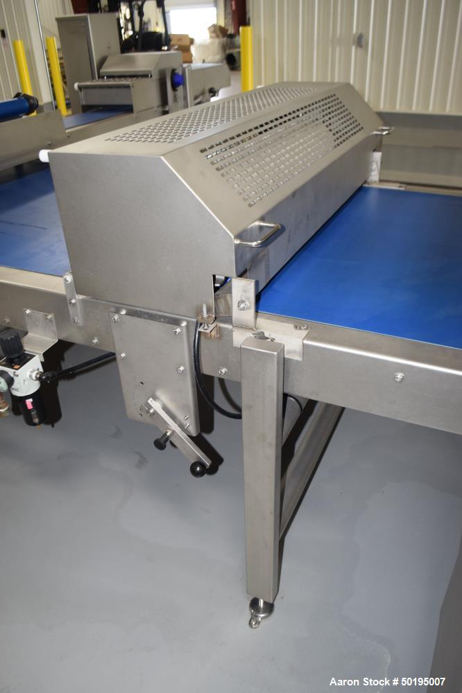 Used Rademaker Sheeting System For Chips, 1000mm Wide, Serial# 7193, Built 2008. Consisting of: (1) 10" wide x 96" long rubber belt conveyor with a 0.37kw gear motor, (1) 3 roll inclined belt feeder ...