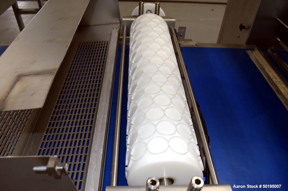 Used Rademaker Sheeting System For Chips, 1000mm Wide, Serial# 7193, Built 2008. Consisting of: (1) 10" wide x 96" long rubber belt conveyor with a 0.37kw gear motor, (1) 3 roll inclined belt feeder ...