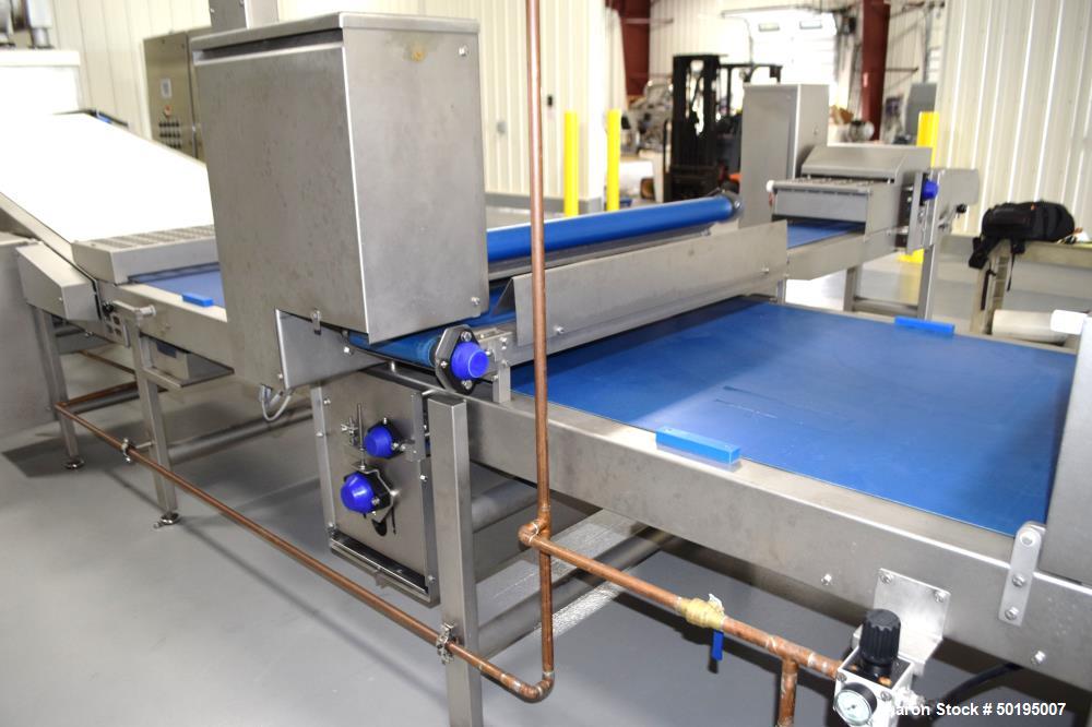 Used Rademaker Sheeting System For Chips, 1000mm Wide, Serial# 7193, Built 2008. Consisting of: (1) 10" wide x 96" long rubber belt conveyor with a 0.37kw gear motor, (1) 3 roll inclined belt feeder ...