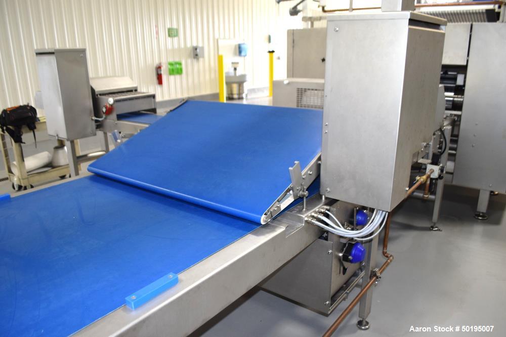 Used Rademaker Sheeting System For Chips, 1000mm Wide, Serial# 7193, Built 2008. Consisting of: (1) 10" wide x 96" long rubber belt conveyor with a 0.37kw gear motor, (1) 3 roll inclined belt feeder ...