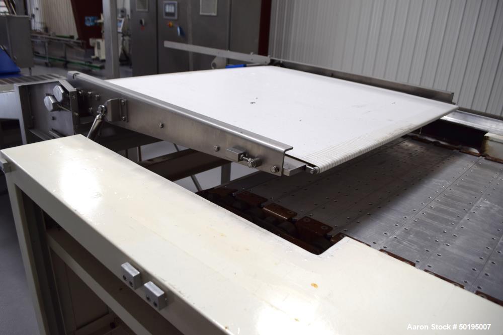 Used Rademaker Sheeting System For Chips, 1000mm Wide, Serial# 7193, Built 2008. Consisting of: (1) 10" wide x 96" long rubber belt conveyor with a 0.37kw gear motor, (1) 3 roll inclined belt feeder ...