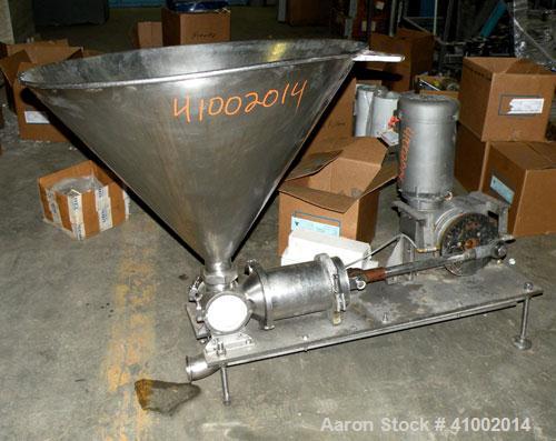 Used Raque Food Systems Food Transfer Pump, 304 Stainless Steel. 3" inlet/outlet. Includes a top feed hopper. Driven by a 5 HP, 3/60/230/460 Volt, 1725 RPM gearmotor. Mounted on a stainless steel bas...
