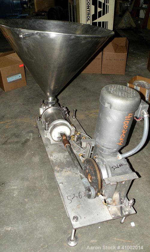 Used Raque Food Systems Food Transfer Pump, 304 Stainless Steel. 3" inlet/outlet. Includes a top feed hopper. Driven by a 5 HP, 3/60/230/460 Volt, 1725 RPM gearmotor. Mounted on a stainless steel bas...