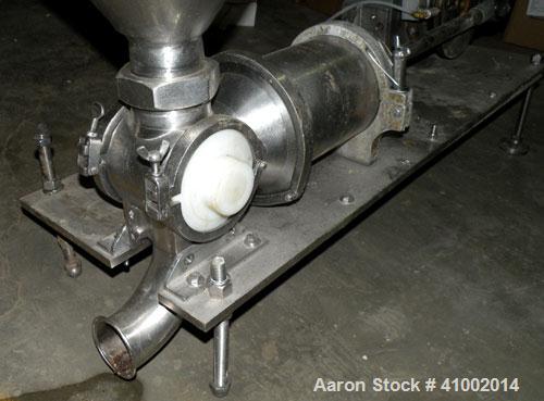 Used Raque Food Systems Food Transfer Pump, 304 Stainless Steel. 3" inlet/outlet. Includes a top feed hopper. Driven by a 5 HP, 3/60/230/460 Volt, 1725 RPM gearmotor. Mounted on a stainless steel bas...