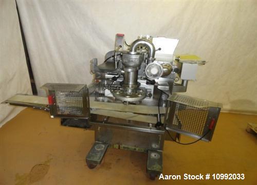 Used Rheon Cornucopia Extruder Encruster, Model KN400, Stainless Steel. Rated 60 PPM. Belt speed .07 - 1.20 feet per second (1.3-22 meters per second), .02 - .66 LB (10-300 gram) weight range, with a...