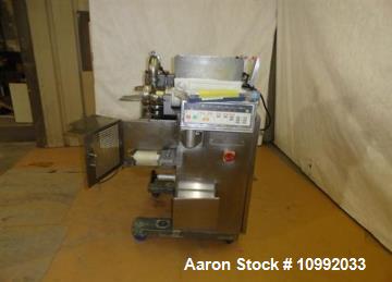 Used Rheon Cornucopia Extruder Encruster, Model KN400, Stainless Steel. Rated 60 PPM. Belt speed .07 - 1.20 feet per second (1.3-22 meters per second), .02 - .66 LB (10-300 gram) weight range, with a...