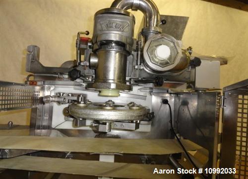 Used Rheon Cornucopia Extruder Encruster, Model KN400, Stainless Steel. Rated 60 PPM. Belt speed .07 - 1.20 feet per second (1.3-22 meters per second), .02 - .66 LB (10-300 gram) weight range, with a...
