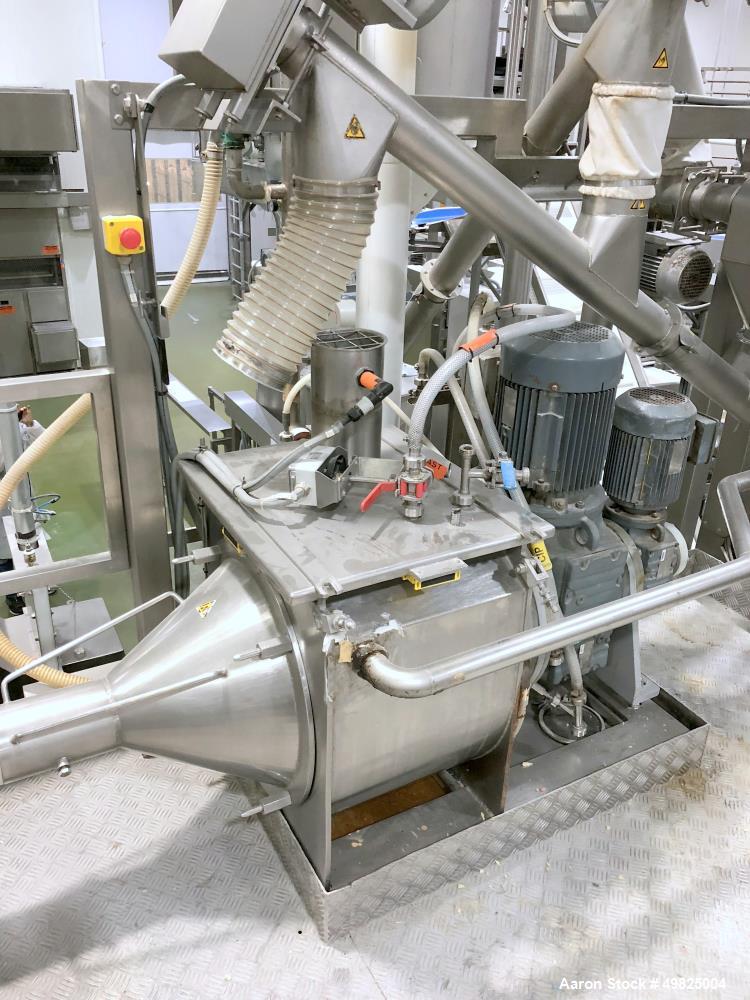 Used- VMI Varymix 2200 Continuous Mixer. Stainless steel construction. Capacity 4,000 lbs per hour. Includes (2) main tanks ...