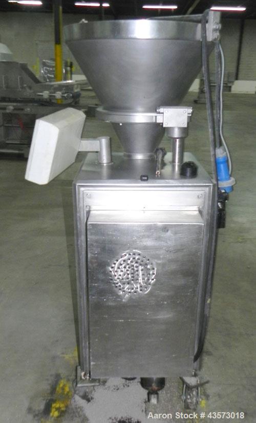 Used Vemag Reiser Continuious Vacuum Filler, Model Robot 500, Type 128/90. Filling rate up to 2,500 kg/hr depending on feed element, portion weight 5-30,000 g, can be set in increments of .01 or 1 g,...