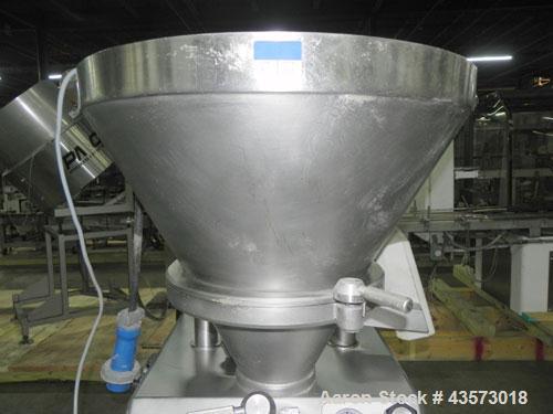 Used Vemag Reiser Continuious Vacuum Filler, Model Robot 500, Type 128/90. Filling rate up to 2,500 kg/hr depending on feed element, portion weight 5-30,000 g, can be set in increments of .01 or 1 g,...