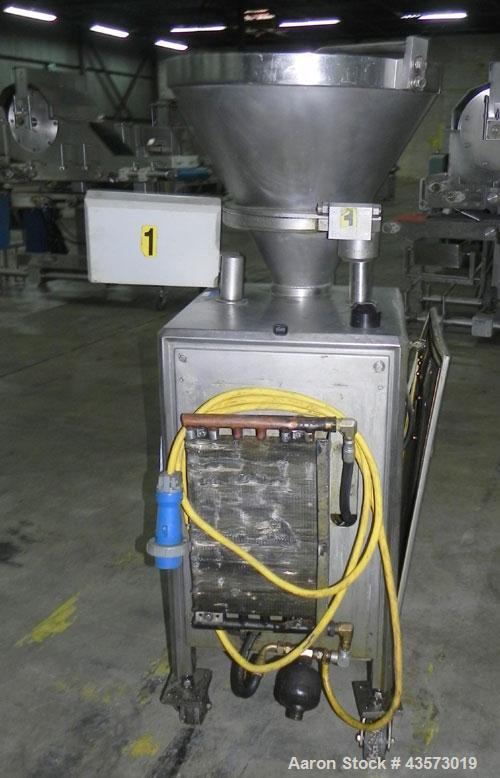 Used Vemag Reiser Continuious Vacuum Filler, Model Robot 500, Type 128/90. Filling rate up to 2,500 kg/hr depending on feed element, portion weight 5-30,000 g, can be set in increments of .01 or 1 g,...