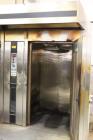 Used Orel Bakery Equipment Pita Bread Oven, Model P Tunnel Oven. In Feed, Transfer Conveyor gas Flat Bread/Pita Oven. Continuous Feed. Dimensions: 30' x 9' x 9'. Control Panel: 30