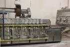Used Orel Bakery Equipment Pita Bread Oven, Model P Tunnel Oven. In Feed, Transfer Conveyor gas Flat Bread/Pita Oven. Continuous Feed. Dimensions: 30' x 9' x 9'. Control Panel: 30