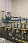 Used Orel Bakery Equipment Pita Bread Oven, Model P Tunnel Oven. In Feed, Transfer Conveyor gas Flat Bread/Pita Oven. Continuous Feed. Dimensions: 30' x 9' x 9'. Control Panel: 30