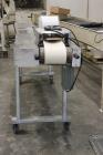 Used Orel Bakery Equipment Pita Bread Oven, Model P Tunnel Oven. In Feed, Transfer Conveyor gas Flat Bread/Pita Oven. Continuous Feed. Dimensions: 30' x 9' x 9'. Control Panel: 30