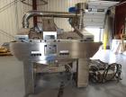 Used Oil Spray Coating Machine. Includes wire mesh belt conveyor, spray applicators and oil recirculation unit. Mounted on casters.  ADD 18% BP AND $500 LOADING FEE.